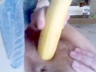 she fucks herself with a banana (private home video)